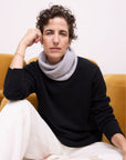 Cashmere Black Serene Crew Sweater soft black cashmere sweater styled with a printed scarf, featuring a timeless crew neckline and elegant minimalist design