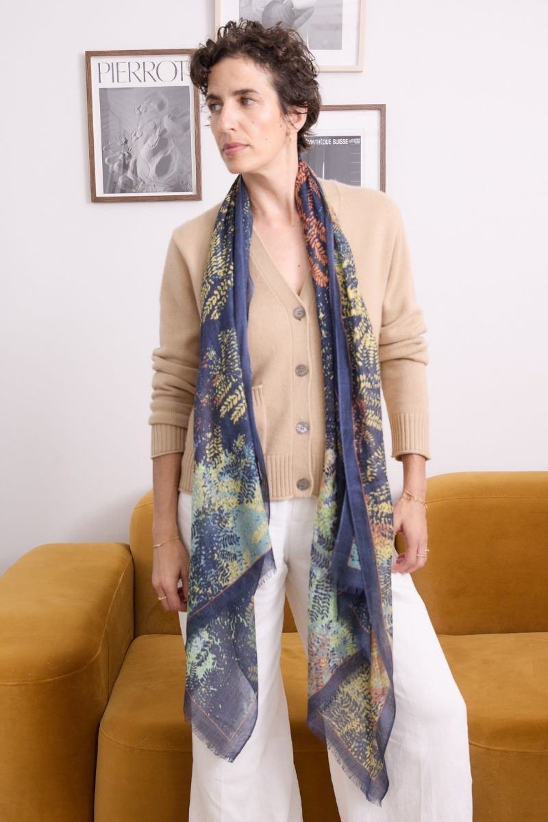 Cashmere Caramel Allure V Neck Cardigan Knit lightweight caramel cashmere cardigan featuring ribbed trims, front pockets and timeless European-inspired styling