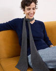 Cashmere Charcoal Skinny Scarf elegant charcoal cashmere skinny scarf styled with a navy knit for timeless everyday sophistication