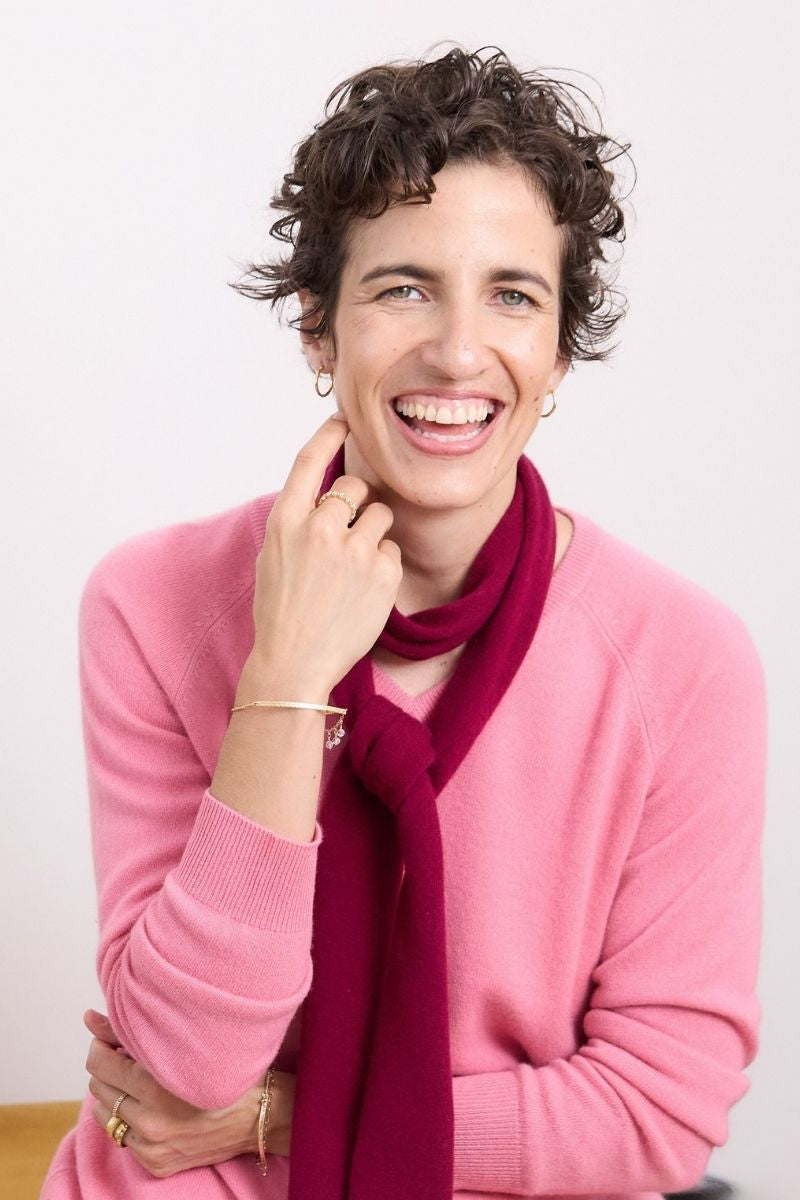 Cashmere Ruby Red Skinny Scarf elegant ruby red 100% cashmere skinny scarf styled with a soft pink knit for timeless everyday sophistication